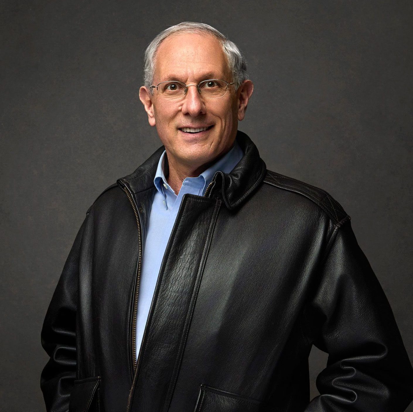 Man's headshot in leather jacket
