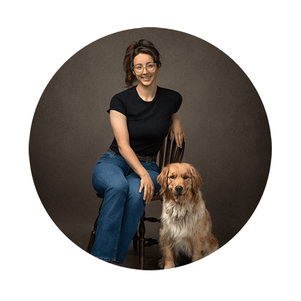 Studio portrait of woman and her dog